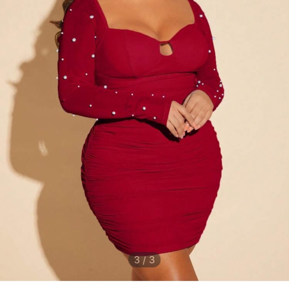 Red dress with pearls on sleeve